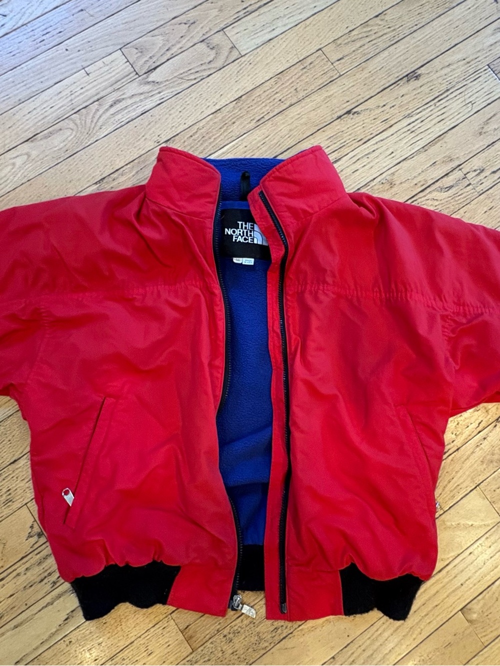 The North Face Unisex Red Jacket with Blue Fleece Liner